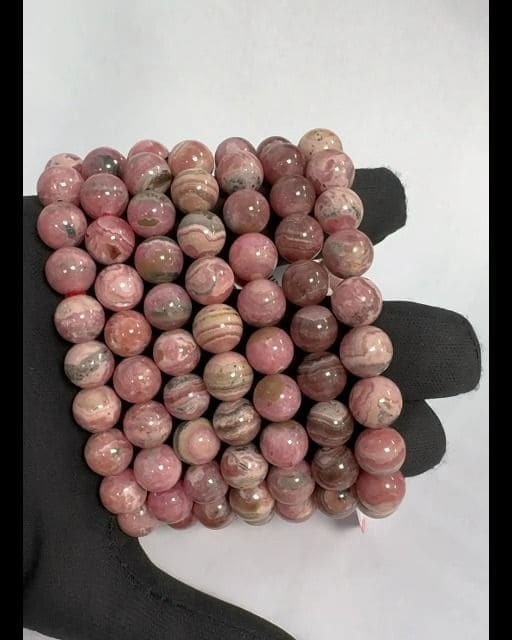 Argentinisches Rhodochrosit-Armband A 9.5–10.5 mm großen Perlen